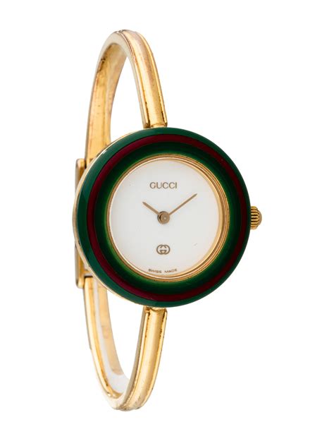 gold gucci bezel watch